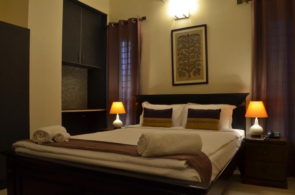Luxtay Suites Bangalore Phòng bức ảnh