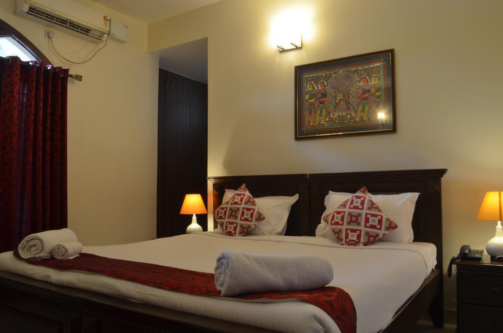 Luxtay Suites Bangalore Phòng bức ảnh